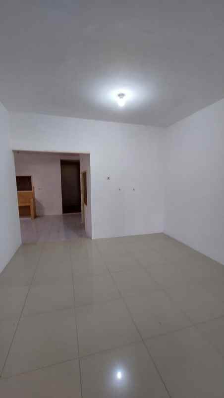 disewakan rumah pantai mentari