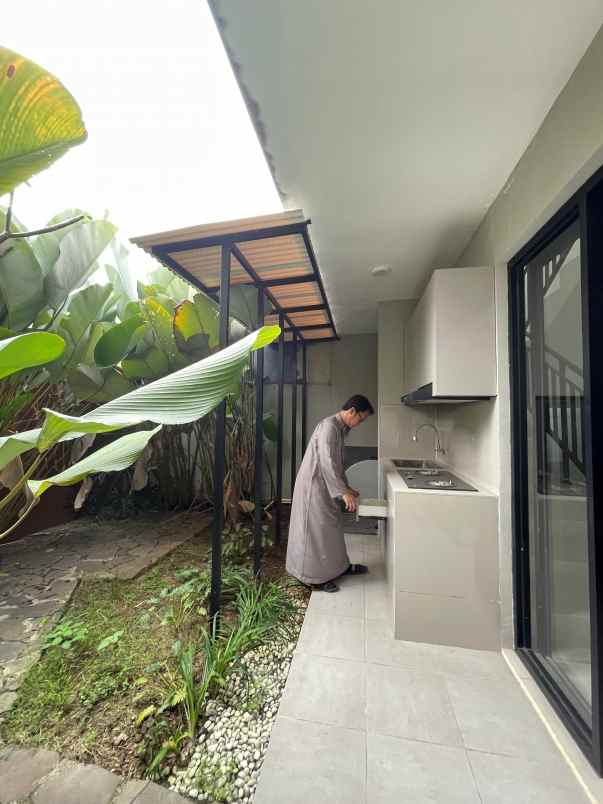 rumah modern tropis asri dekat kampus ipb