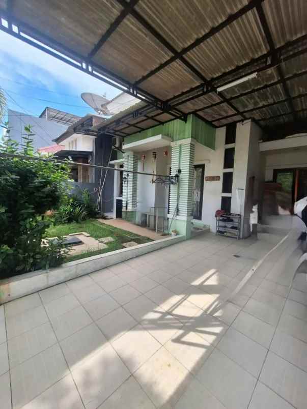 dijual rumah cluster aralia harapan