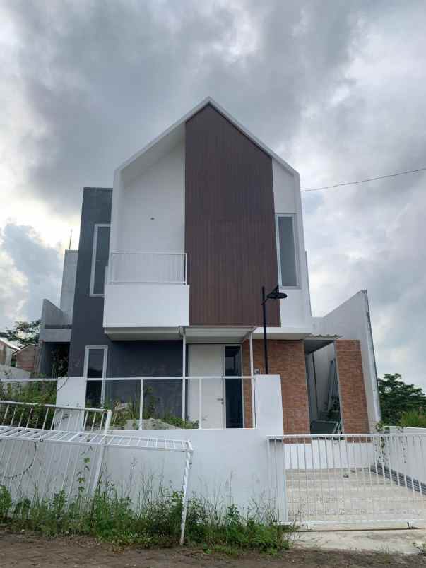 dijual rumah cluster mountana hills bringin