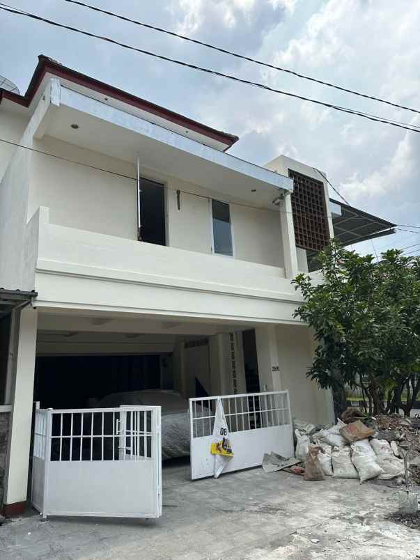 dijual rumah dharmahusada permai