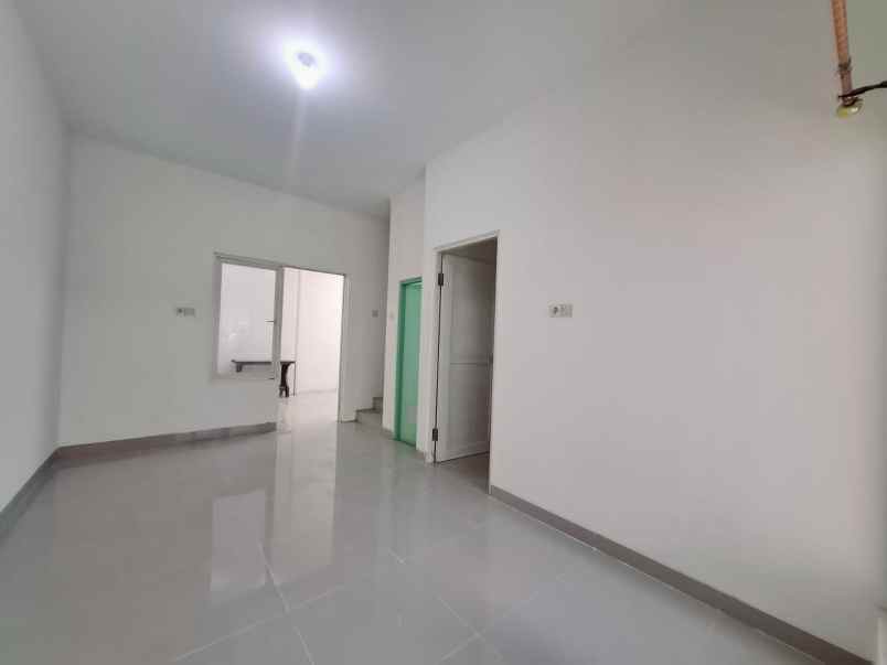 dijual rumah green mansion regency