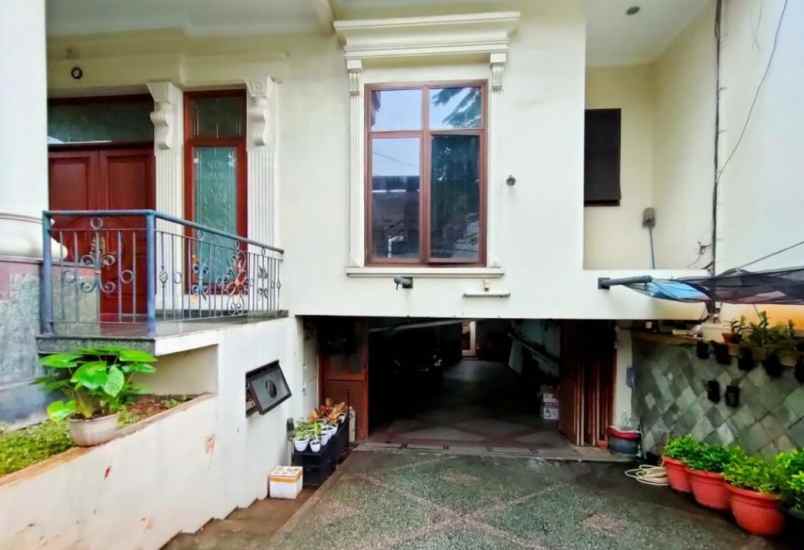 dijual rumah jalan raya kuningan barat