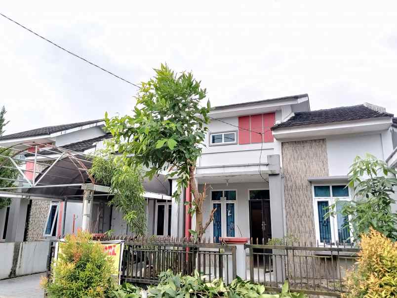 dijual rumah jl guna karya