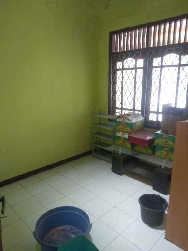 dijual rumah jl raya taman cimanggu