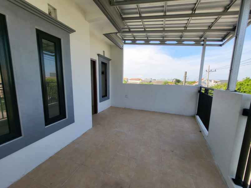 dijual rumah jln raya medokan ayu