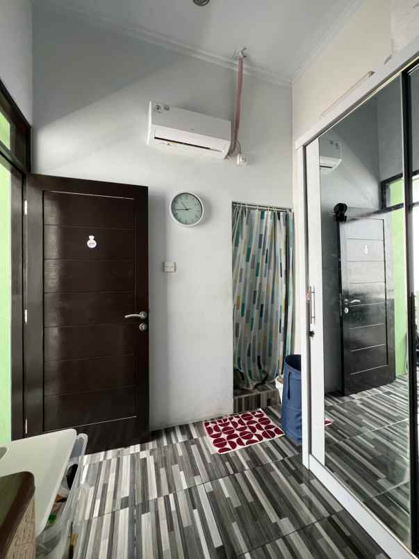 dijual rumah perumnas rawalumbu bojong