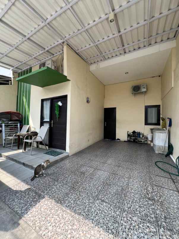 dijual rumah perumnas rawalumbu bojong