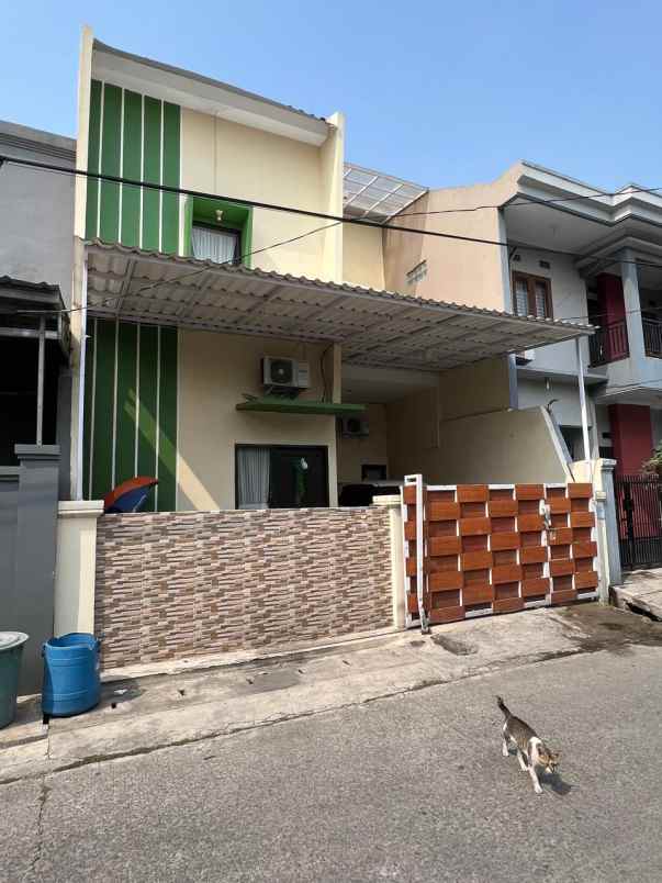 dijual rumah perumnas rawalumbu bojong