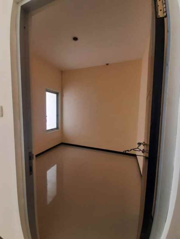 disewakan rumah pantai mentari