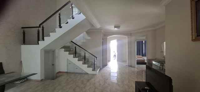 rumah hook lt marmer cozy raffles hills cibubur