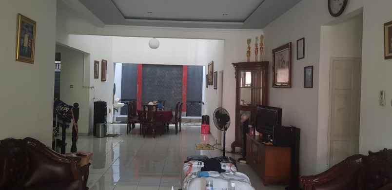 rumah jalan raya pondok kelapa