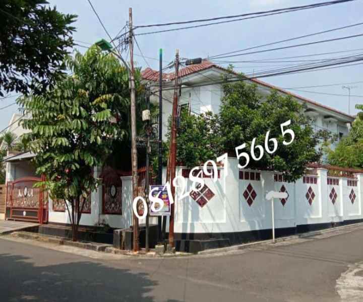 rumah jalan raya pondok kelapa