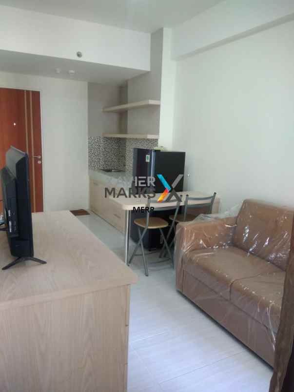 apartemen puncak dharmahusada 2br full furnish