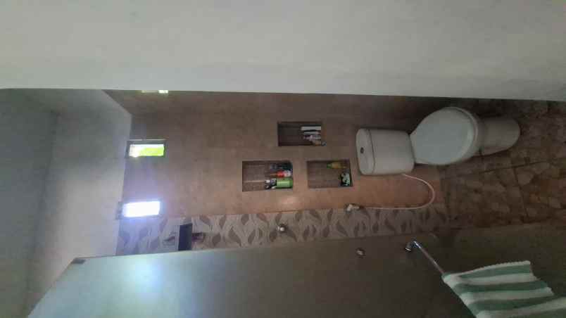 dijual rumah 2 lantai di desa klompangan ajung jember