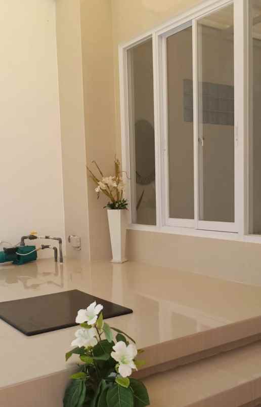 dijual rumah pakuwon city taman mutiara