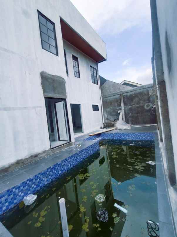 dijual rumah tapos