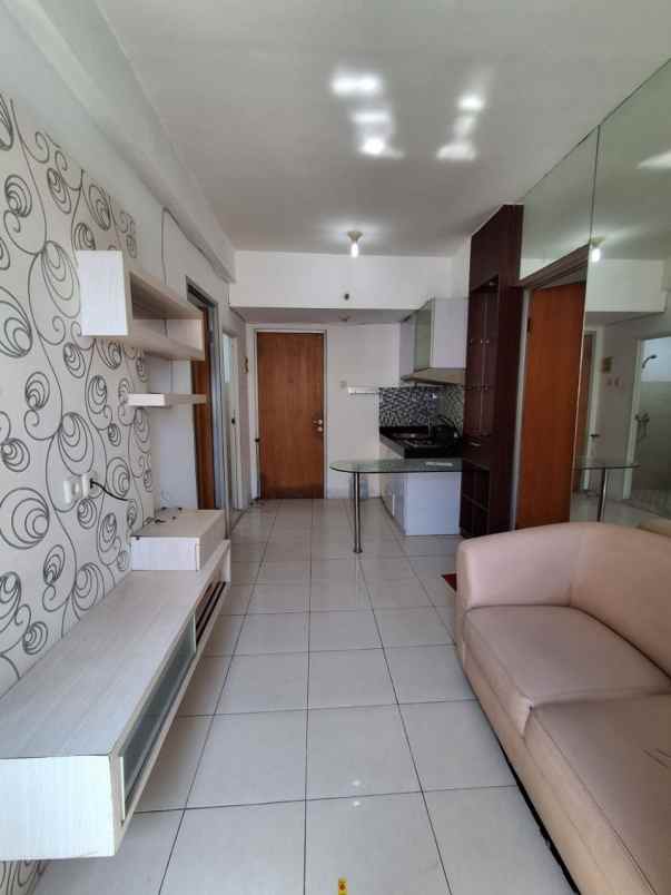 apartemen puncak permai tower c lantai 17 connecting
