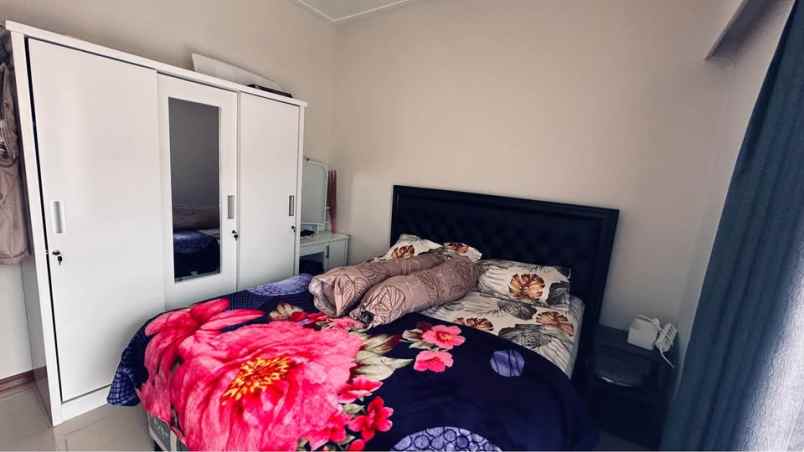 dijual rumah cluster bali garden city