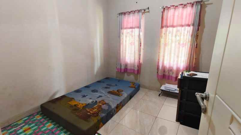 dijual rumah cluster garden fiesta