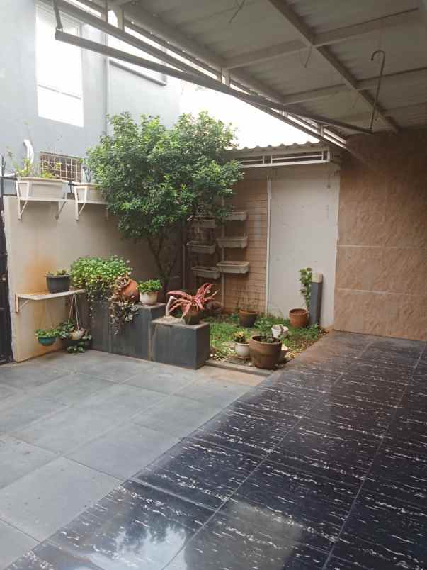 dijual rumah cluster palm spring jgc