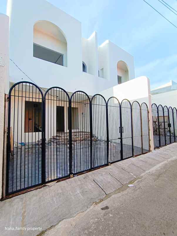 dijual rumah jalan raya kelapa dua