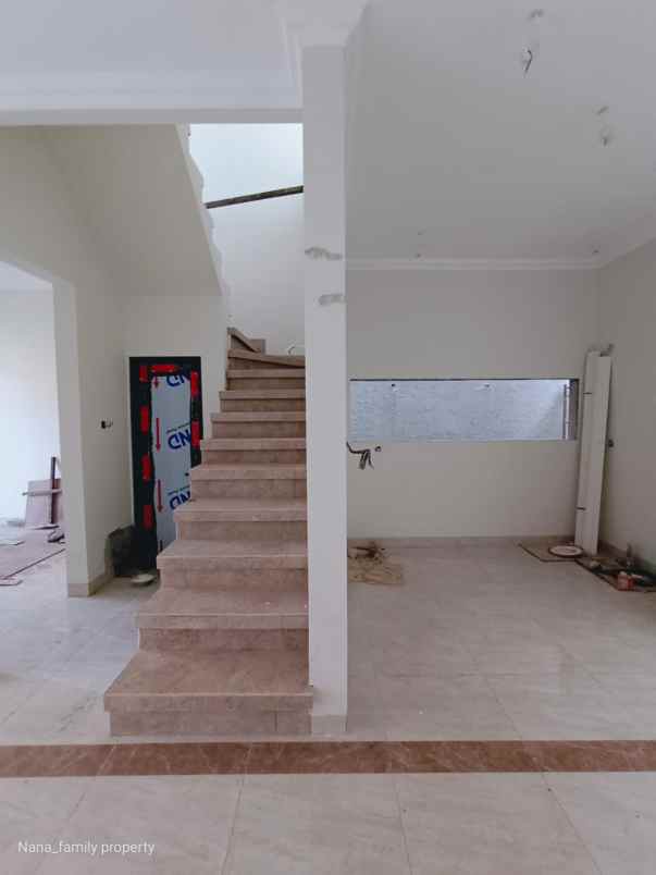 dijual rumah jalan raya kelapa dua