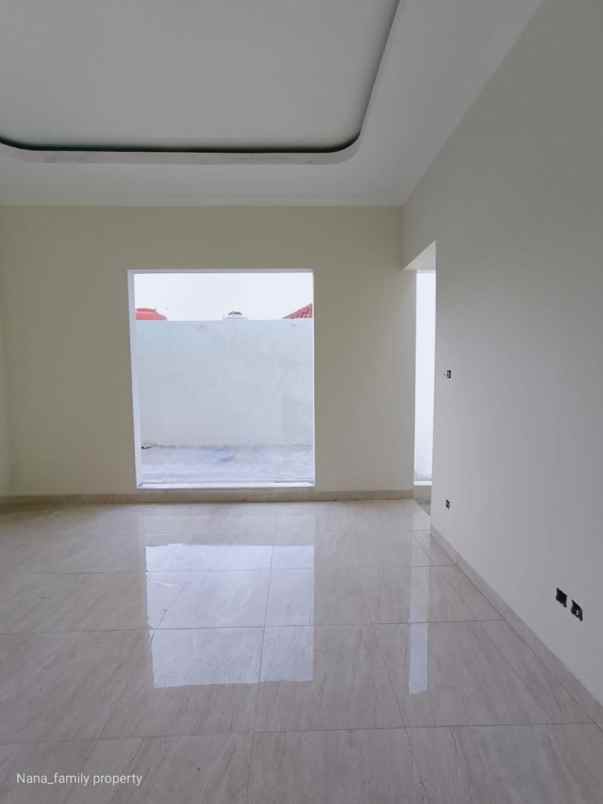 dijual rumah jalan raya kelapa dua