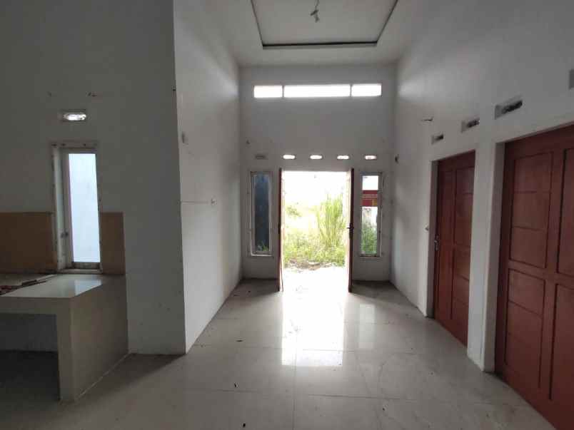 dijual rumah jl bunga inem