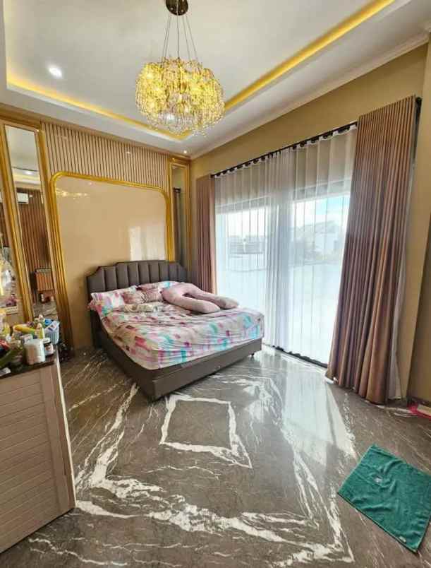 dijual rumah kota harapan indah