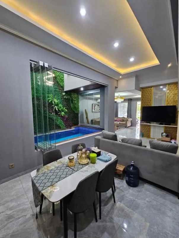 dijual rumah kota harapan indah