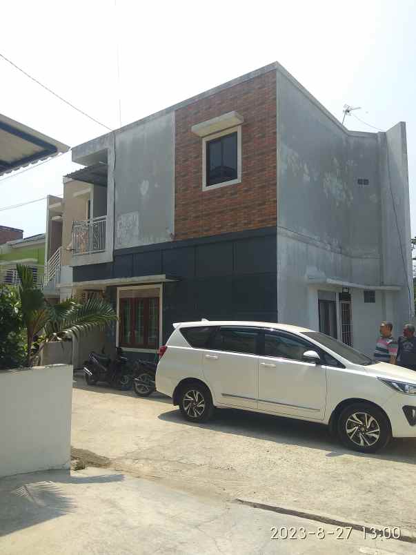 rumah 2 lantai model void di korpri