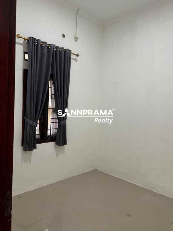 rumah apik terawat dalam cluster di pasir putih depok