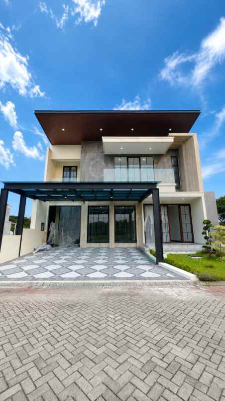 rumah besar minimalis pakuwon city grand island