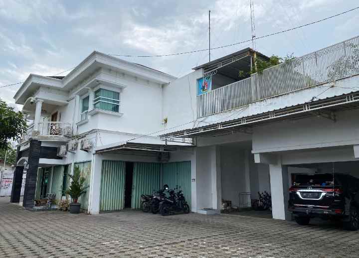 rumah jalan sidokarto area sawah