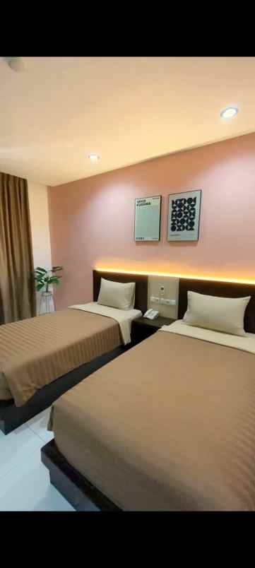 dijual hotel jalan wolter monginsidi