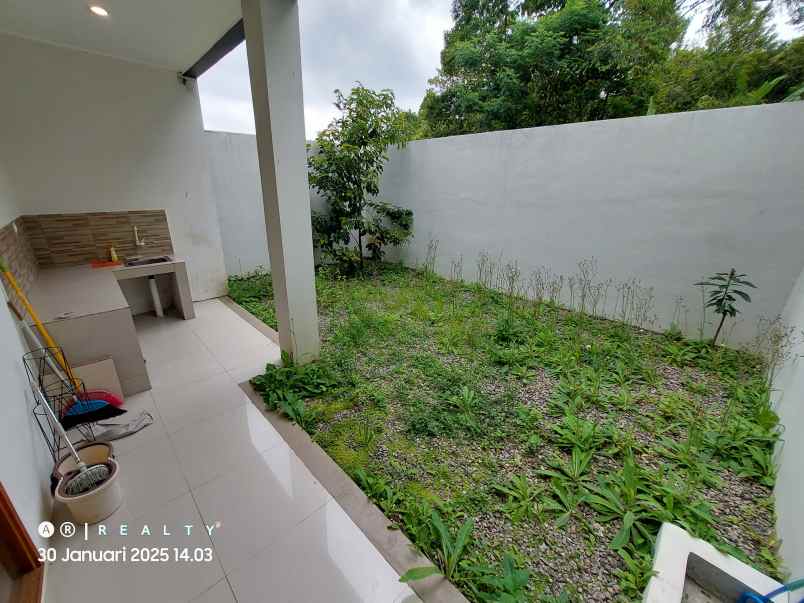 dijual rumah bali garden city view