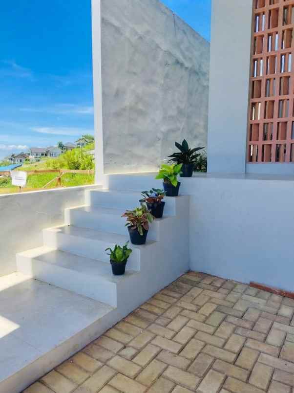 dijual rumah cluster villa tropis dago