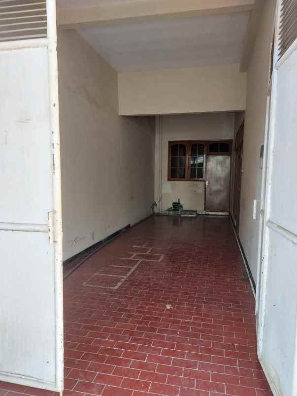 dijual rumah dharmahusada indah