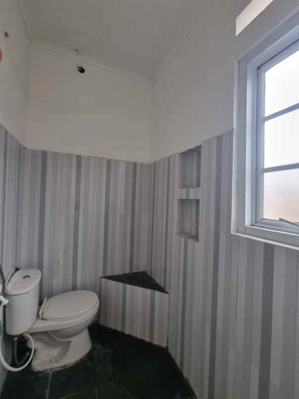 dijual rumah jalan raya bakti jaya