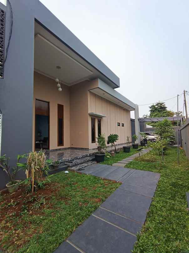 dijual rumah komplek deplu pondok aren