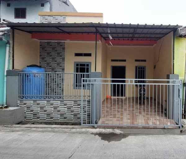 dijual rumah taman harapan baru