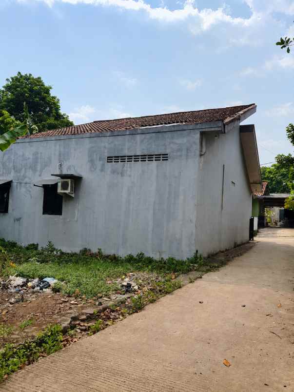dijual tanah belakang perumahan puri