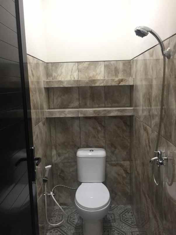 rumah jl kh muhidin tanah sareal