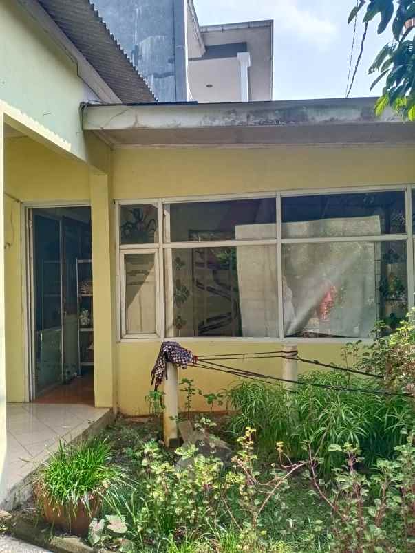 rumah jln raya sawangan permai