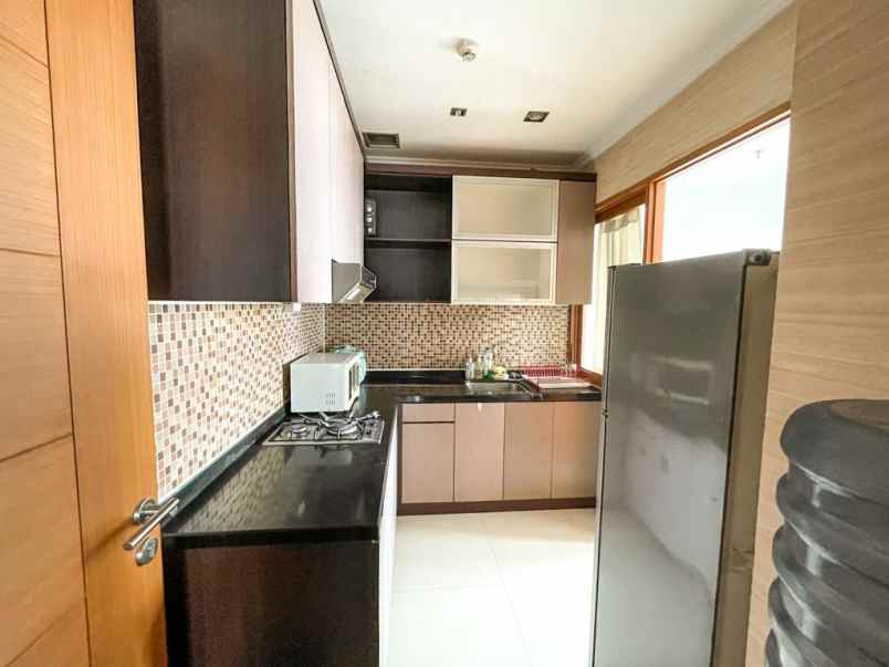 aparment hampton park tarogong pondok indah 130 jt thn