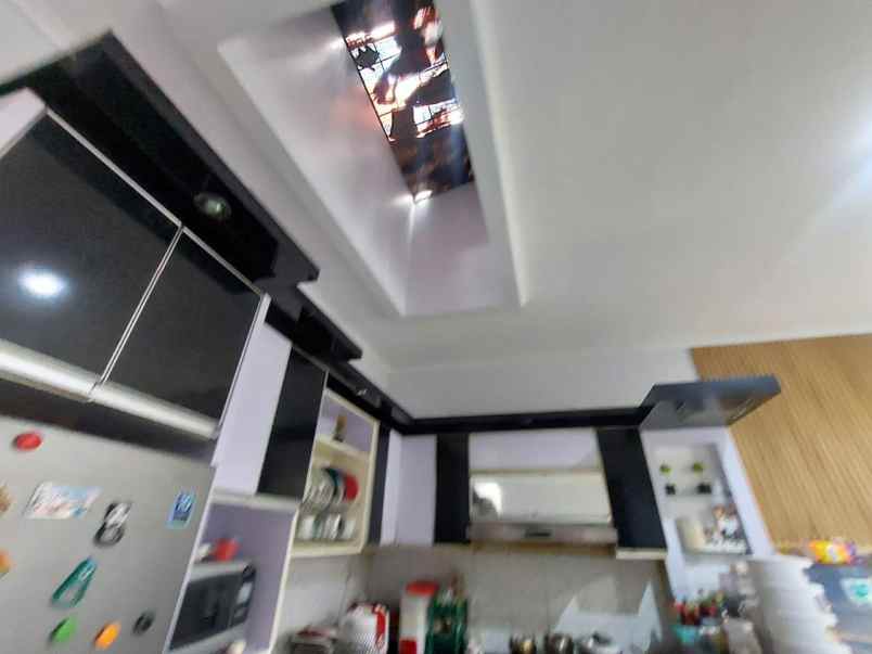 dijual rumah cluster harmoni harapan indah