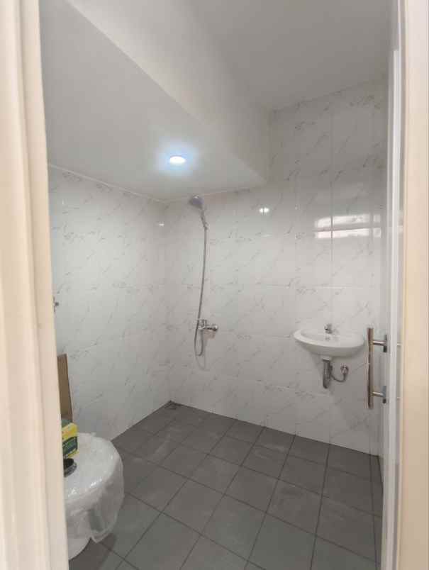 dijual rumah cluster harmony village