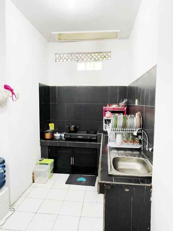 dijual rumah cluster mega regency