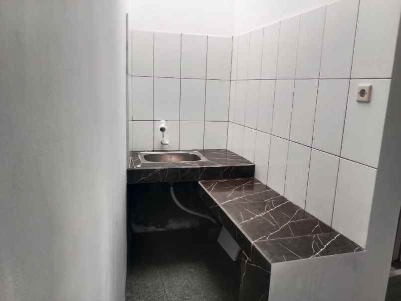 dijual rumah jl islamic center atas